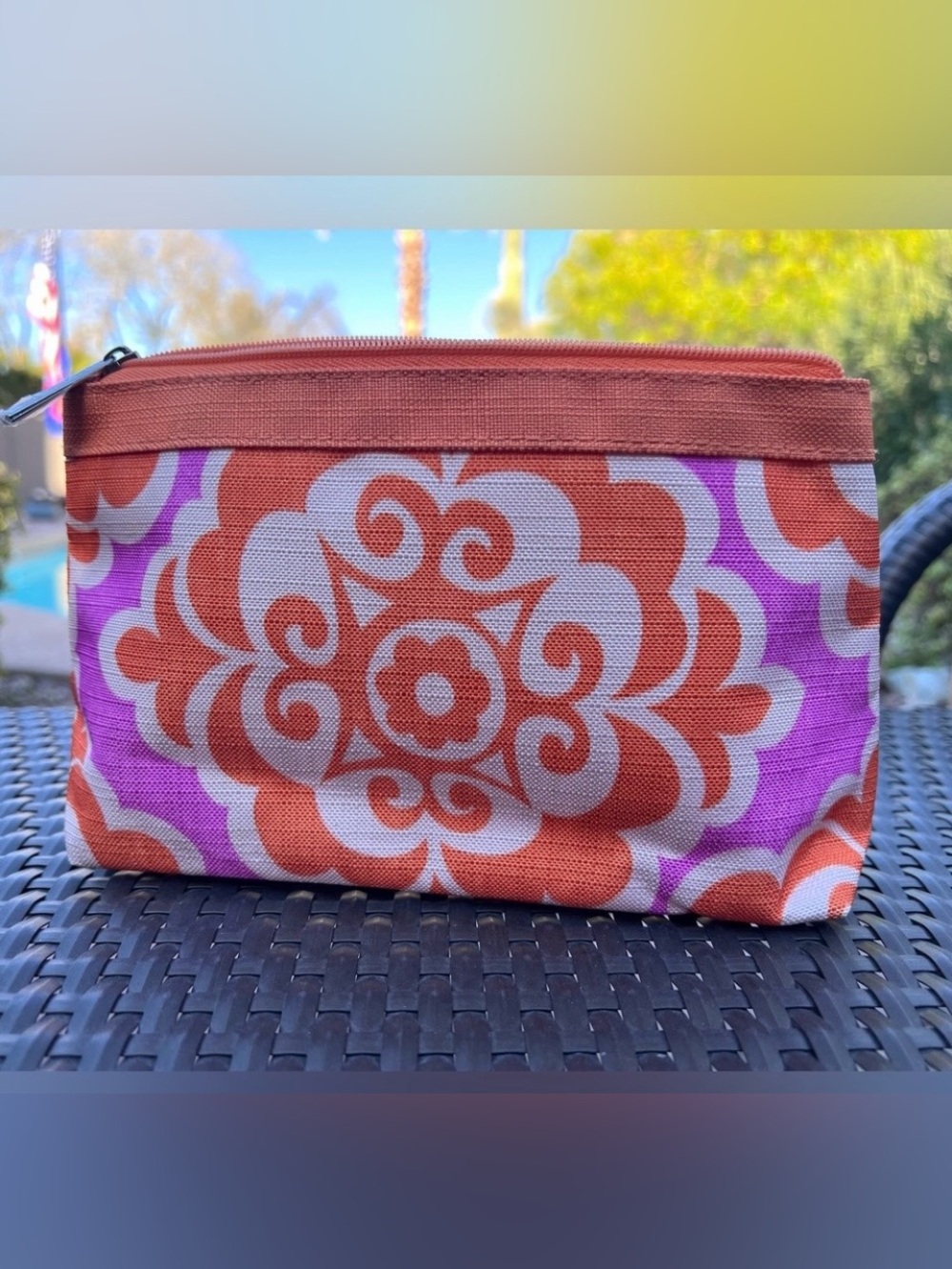CLINIQUE Orange and Pink Patterned Cosmetic Bag with Random Bath or Body Item